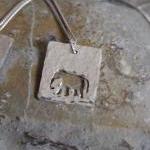Silver Elephant Pendant: A Textured Sterling..