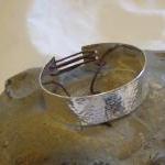 Silver Textured Bracelet With Corset Effect Lace..