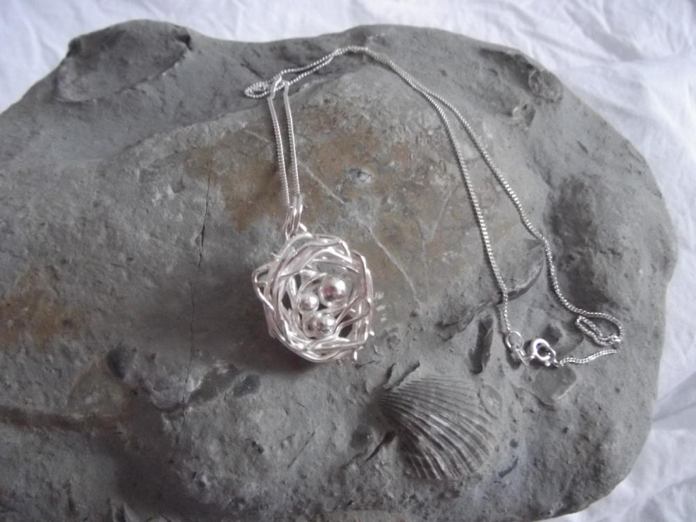 Silver Nest Pendant : A Sterling Silver Birds Nest Made From Wire.