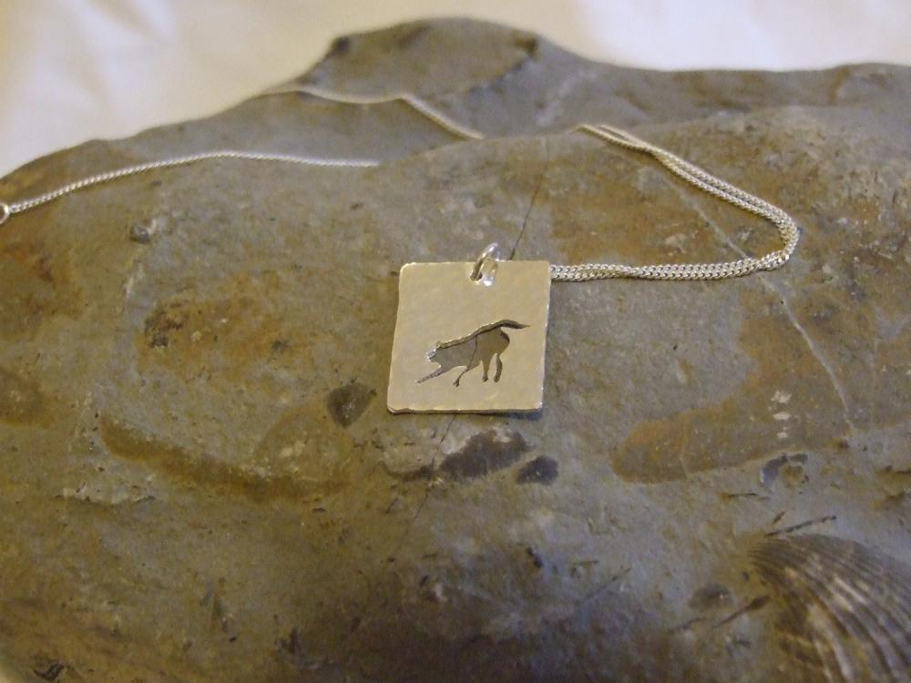 Silver Fox Pendant: A Playful Fox Silhouette Pendant On A Background Of Textured Sterling Silver.