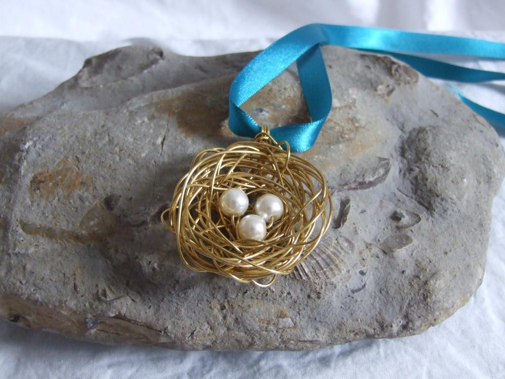 Brass Nest Pendant: A Cute Birds Nest Pendant Made From Wire With Three White Pearl Bead Eggs.